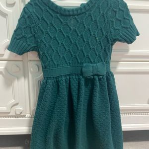 Girls size 5 knit dress. But up in the back. Beautiful for the holidays. Cozy